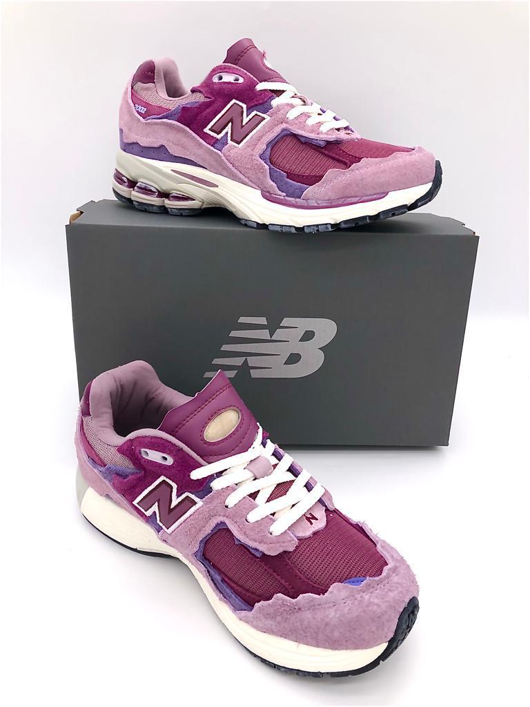 Les baskets New Balance 2002R Protection Pack Pink pour femmes offrent une allure moderne et féminine. Commandez les vôtres dès aujourd'hui et faites sensation !