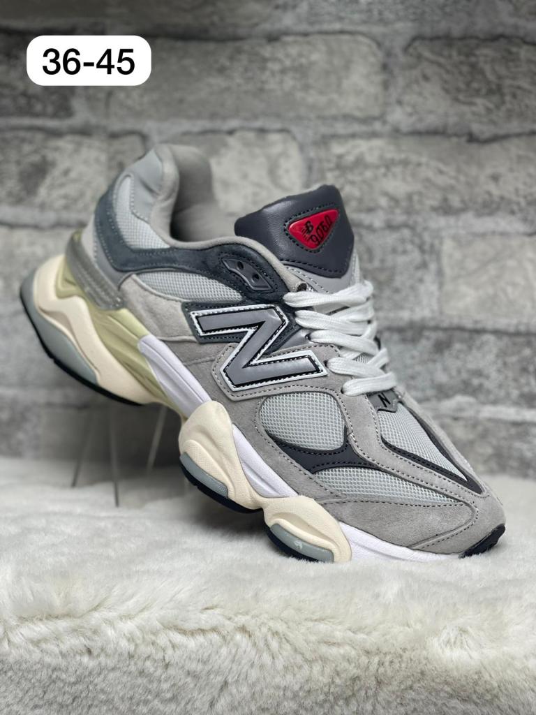 Des baskets New Balance 9060 Grey Cream Trainer qui conjuguent à merveille style et confort, pour une allure inégalée !"